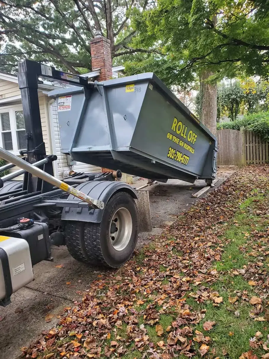 Roll Off On The Go container being delivered at a home